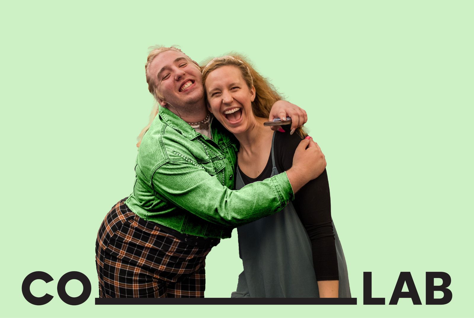 A CO_LAB actor and teaching artist embrace